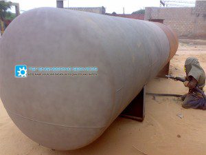 sand blasting on diesal storage tank 